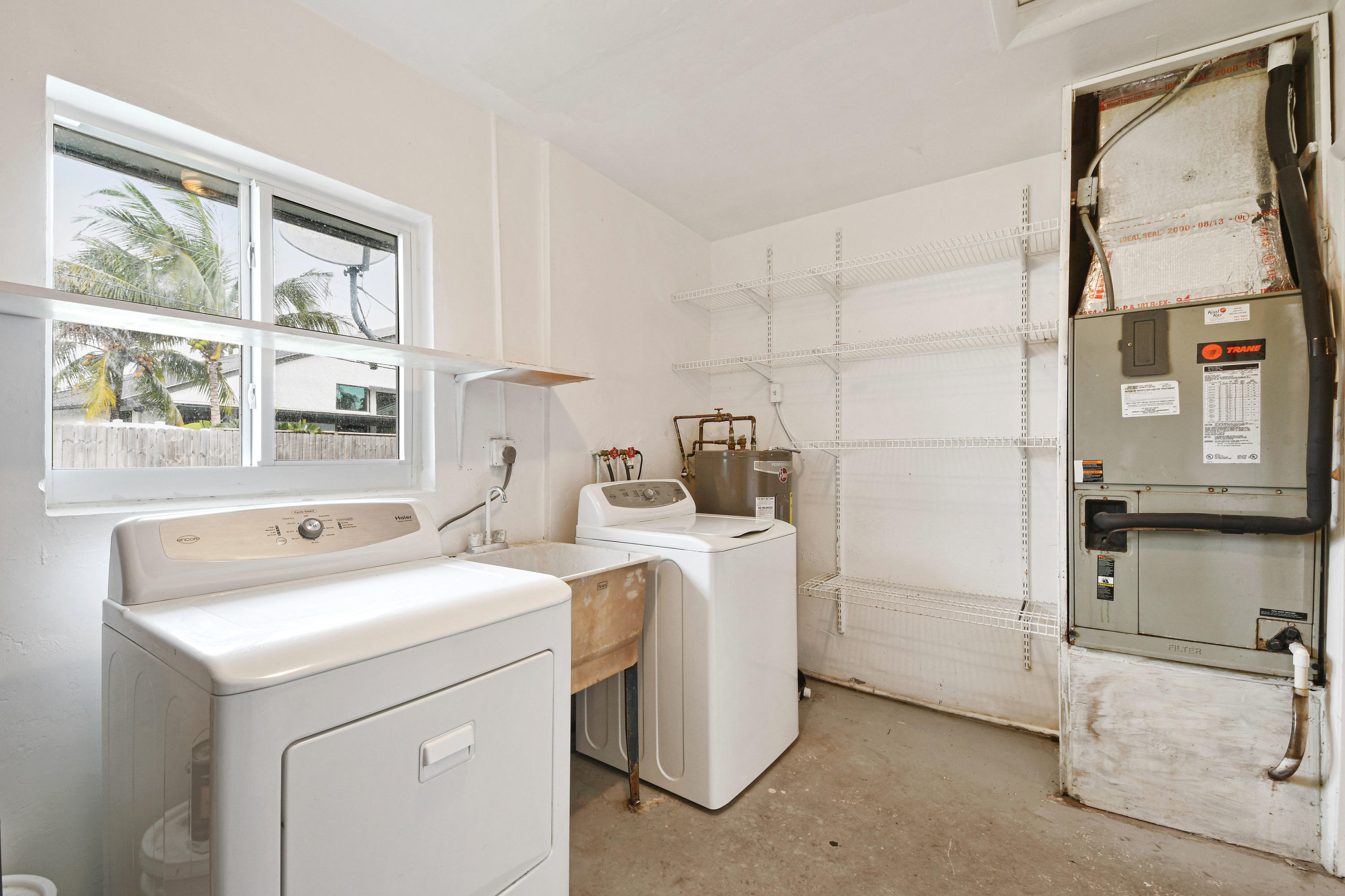 2003 Park Place Boca Raton, FL 33486 - Photo 36 of 42 a utility room with dryer and washer