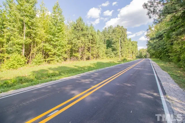 a view of a yard with an trees