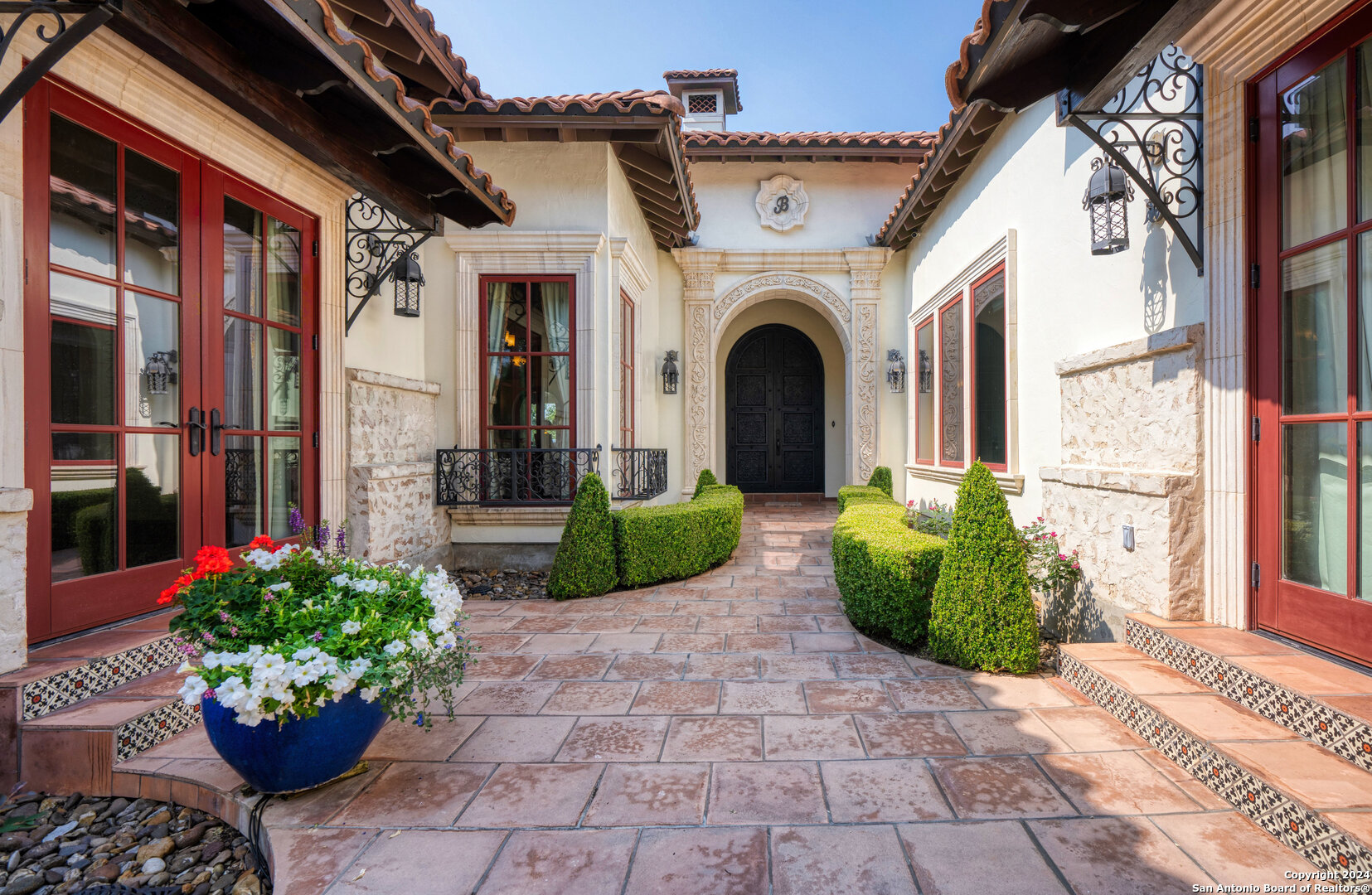 211 Augusta Boerne, TX 78006 - Photo 16 of 59 a front view of a house with garden