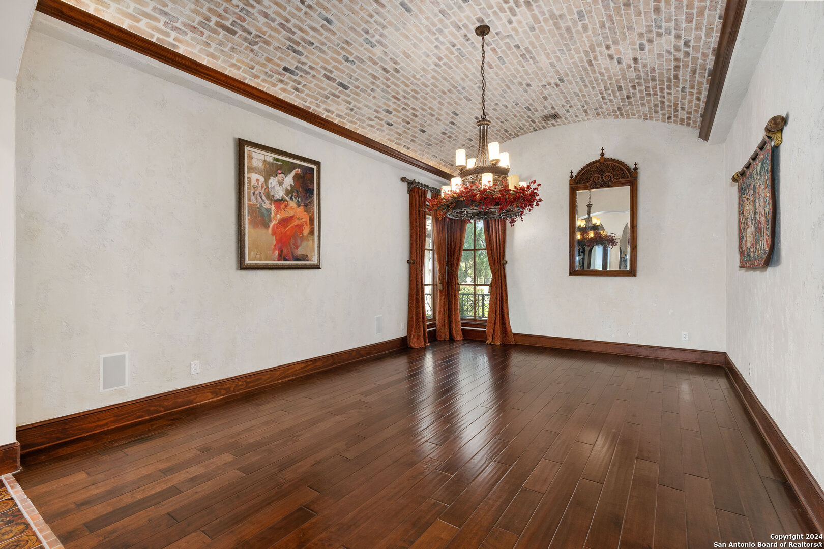 211 Augusta Boerne, TX 78006 - Photo 19 of 59 a view of a livingroom with wooden floor and a ceiling fan