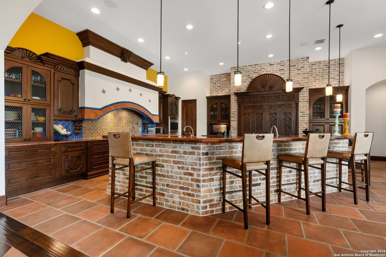 211 Augusta Boerne, TX 78006 - Photo 27 of 59 a kitchen with a table and chairs