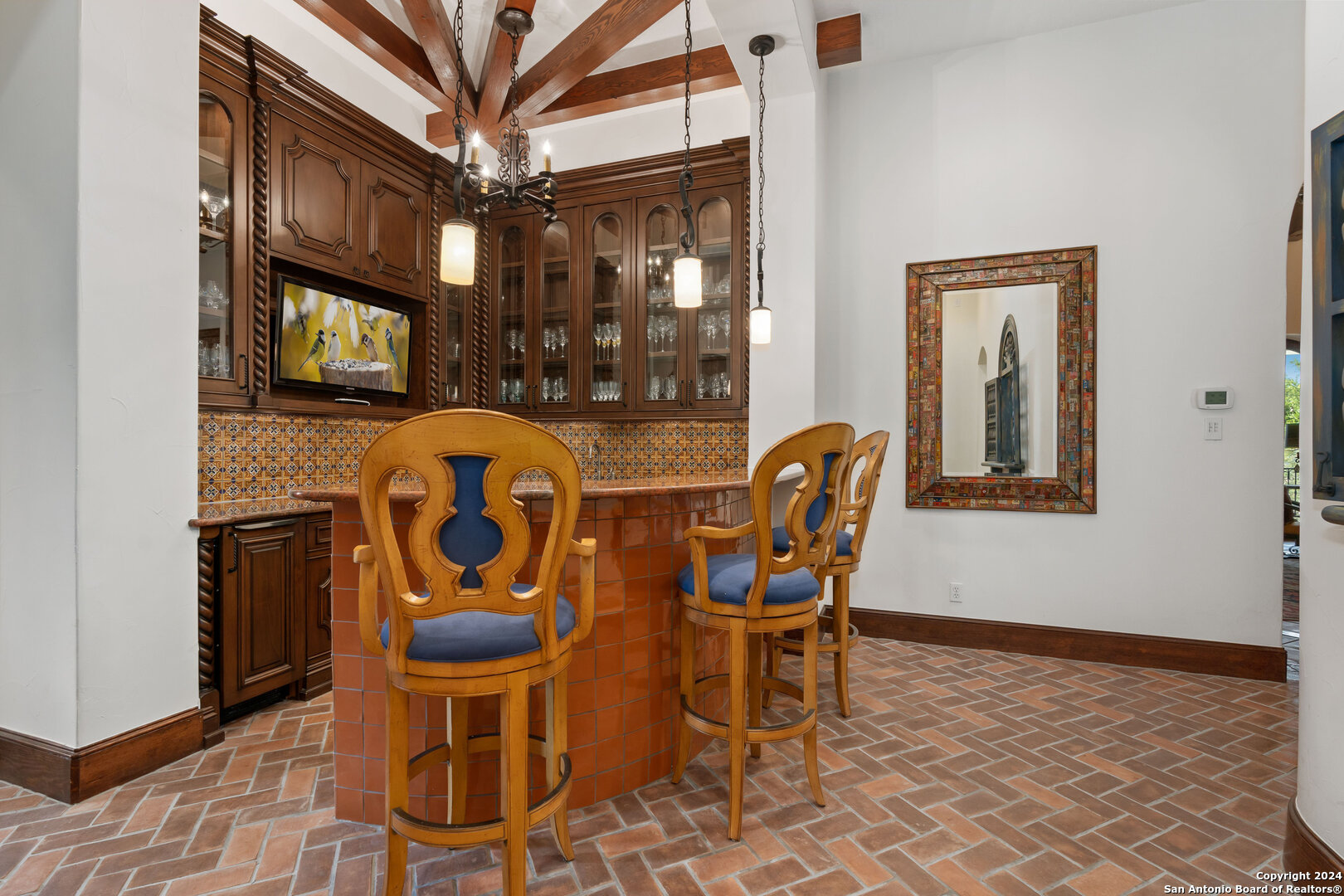 211 Augusta Boerne, TX 78006 - Photo 32 of 59 a view of a dining room with furniture and chandelier