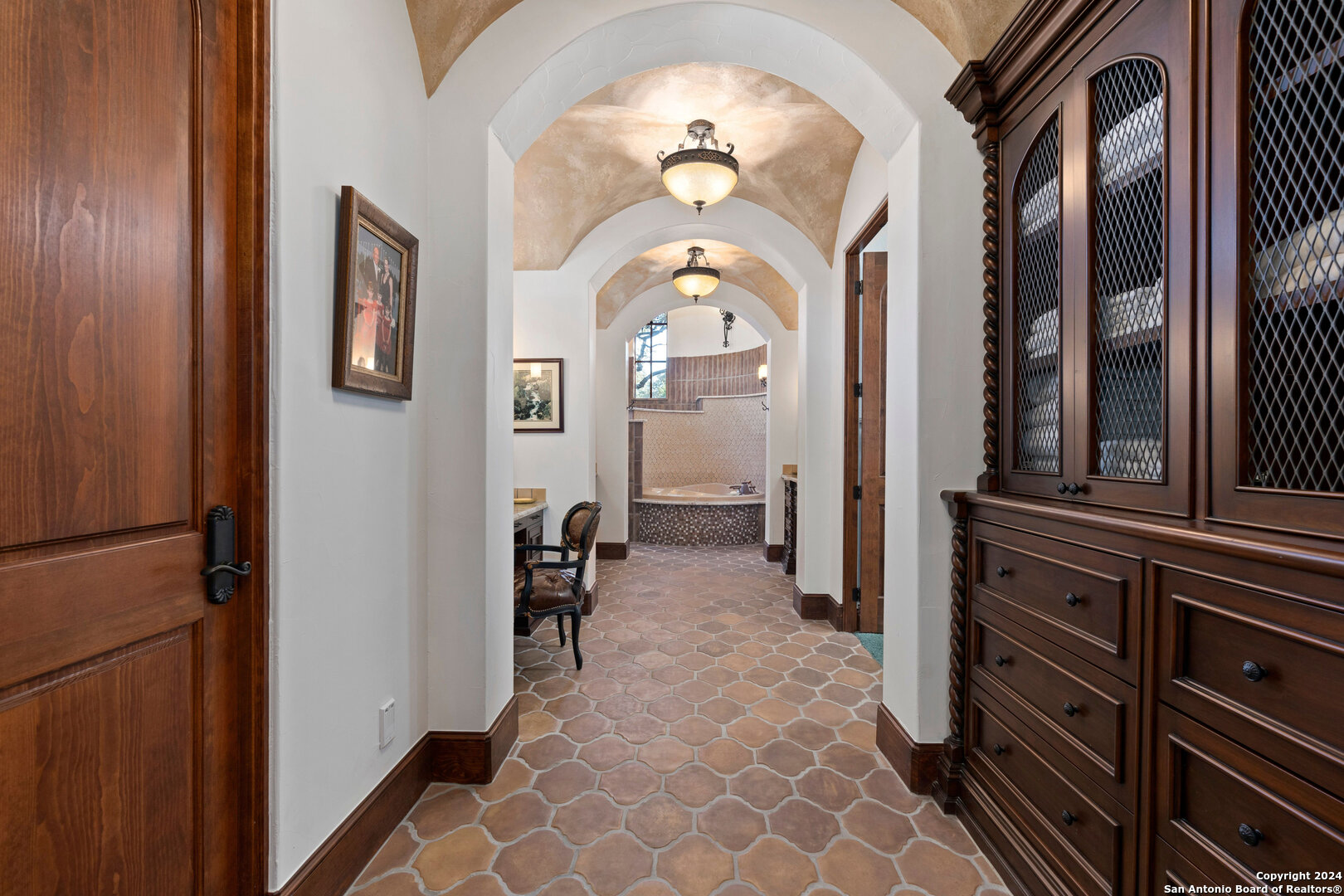 211 Augusta Boerne, TX 78006 - Photo 36 of 59 a view of a hallway with entryway dining room and hall with wooden floor