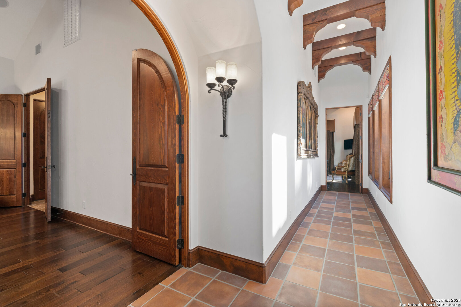 211 Augusta Boerne, TX 78006 - Photo 41 of 59 a view of a hallway with wooden floor and windows