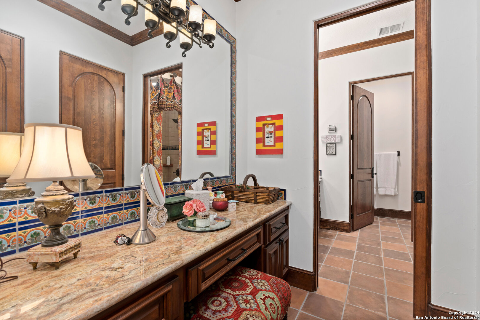 211 Augusta Boerne, TX 78006 - Photo 46 of 59 a view of a bathroom with a sink and a mirror