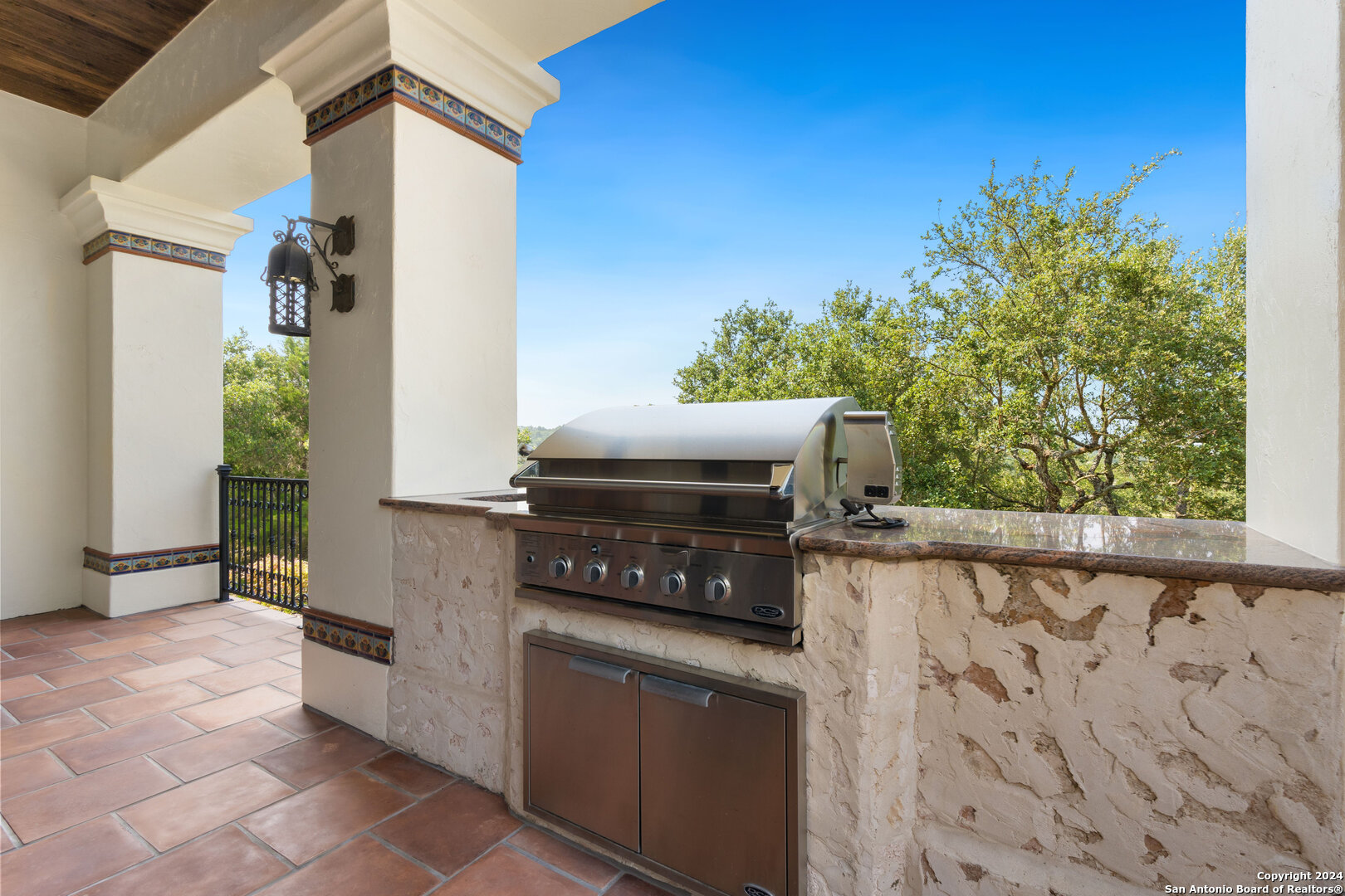 211 Augusta Boerne, TX 78006 - Photo 54 of 59 a kitchen with a stove and a potted plant