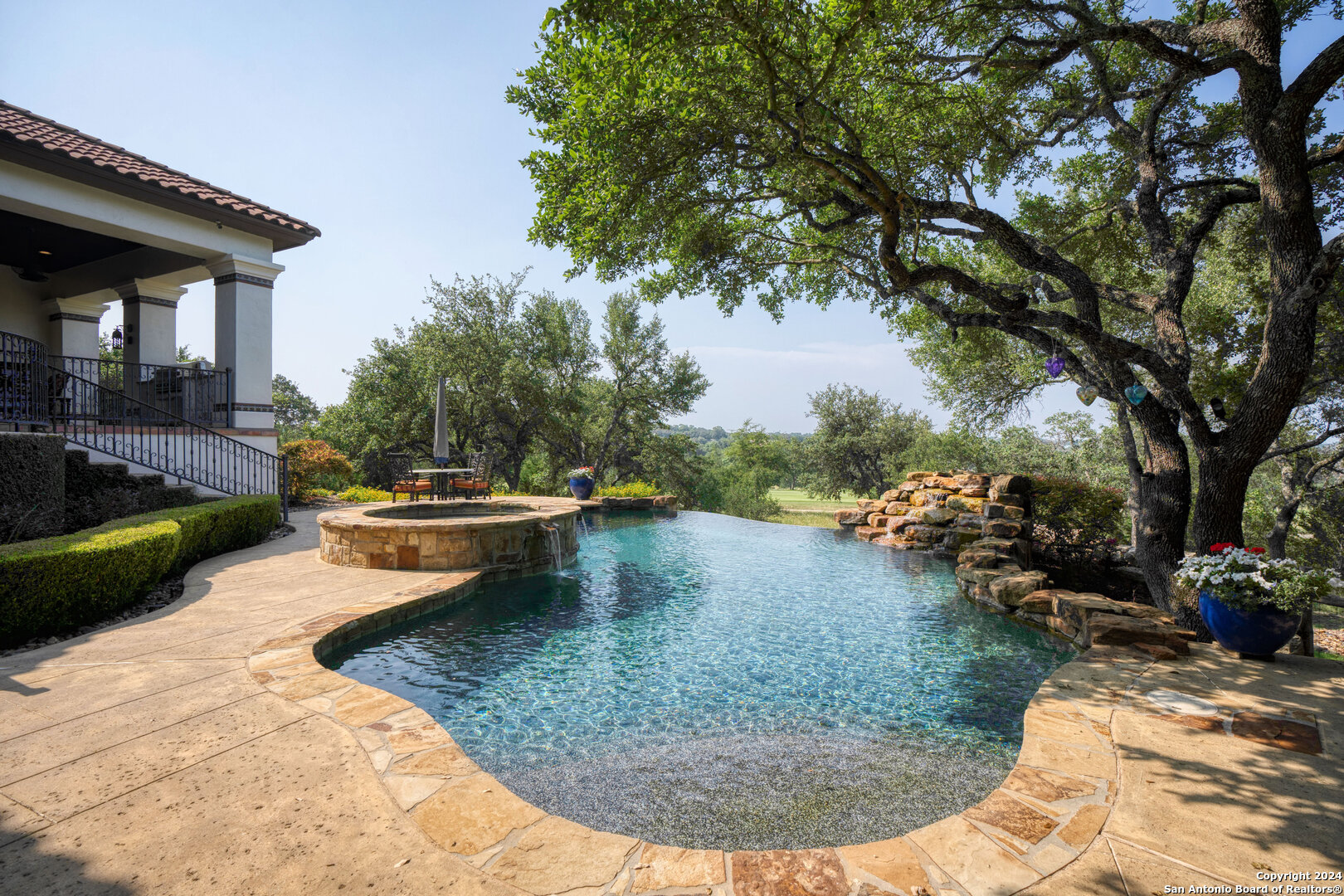 211 Augusta Boerne, TX 78006 - Photo 56 of 59 a view of a swimming pool with a sitting space