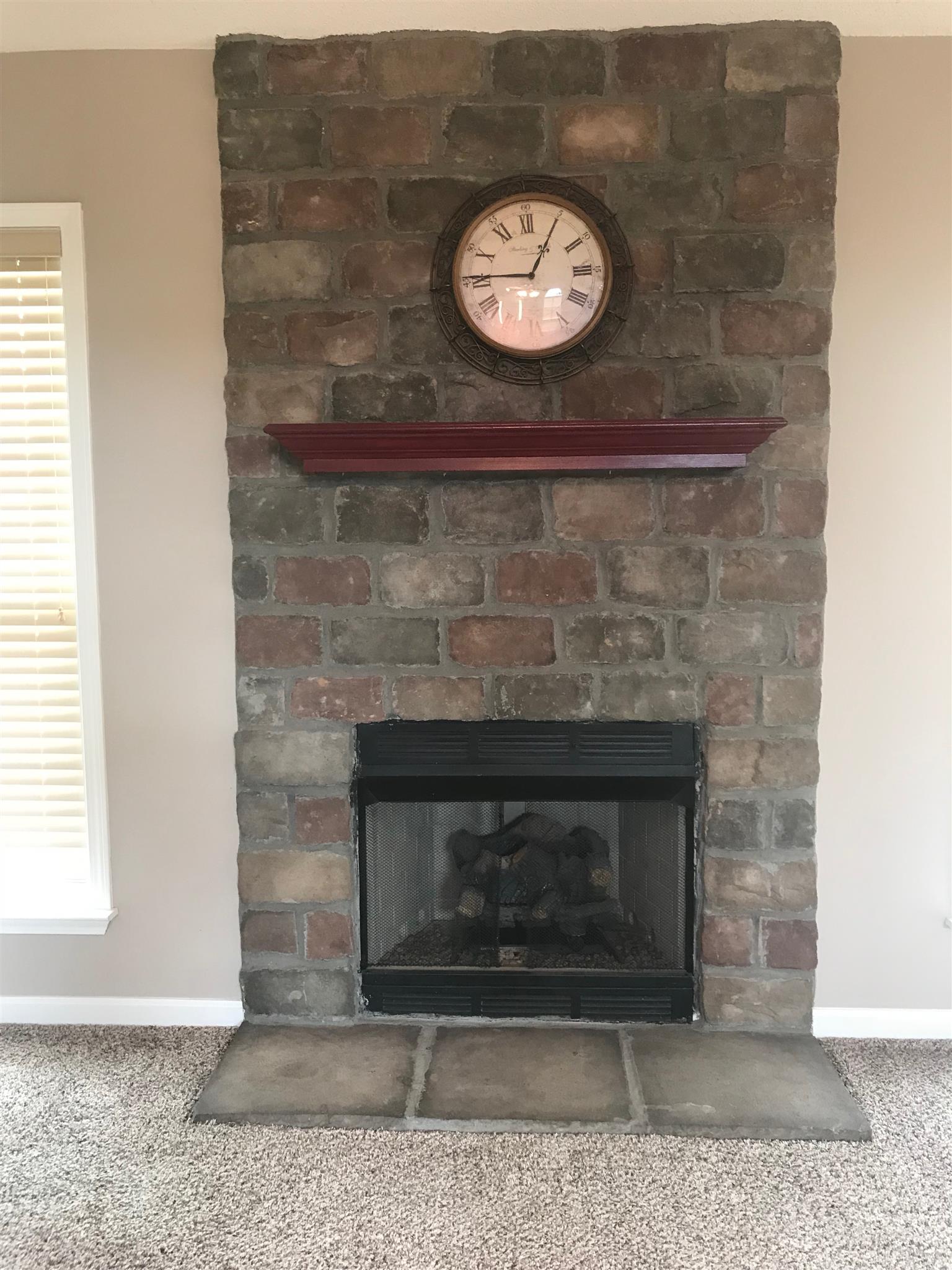 231 7 Mile Ferry Road Cunningham, TN 37052 - Photo 6 of 30 a view of a fireplace