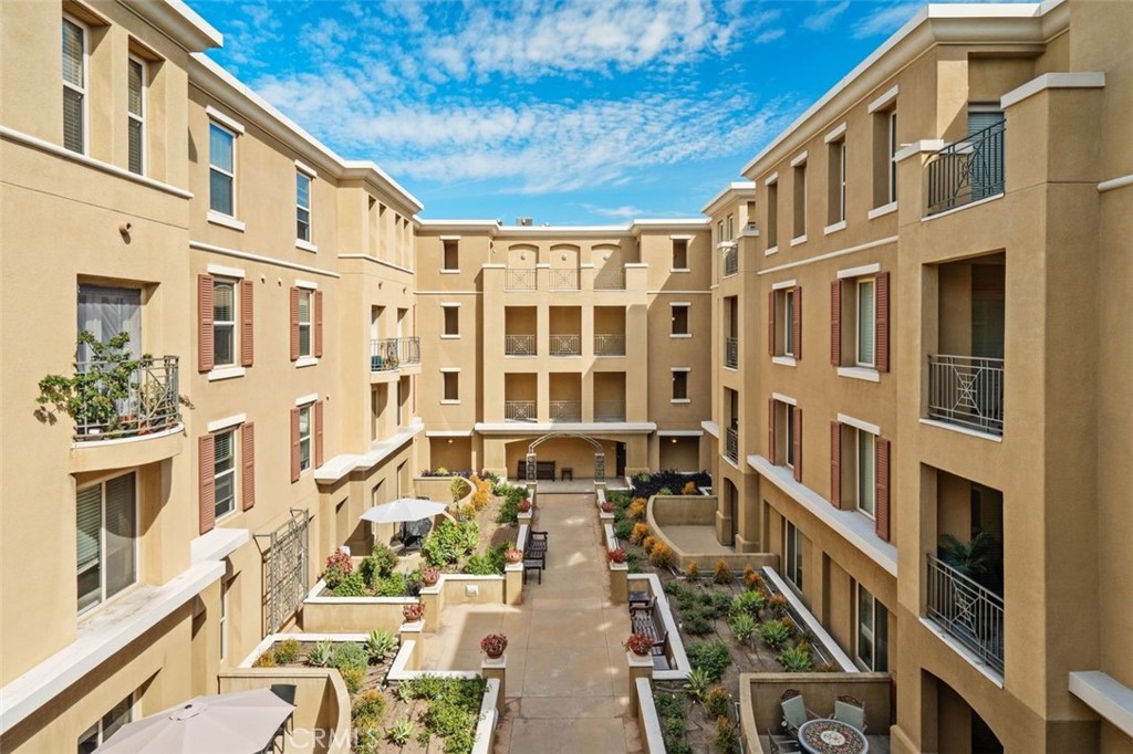 128 North Oak Knoll Avenue, Unit 317 Pasadena, CA 91101 - Photo 22 of 22 a view of a building with many windows