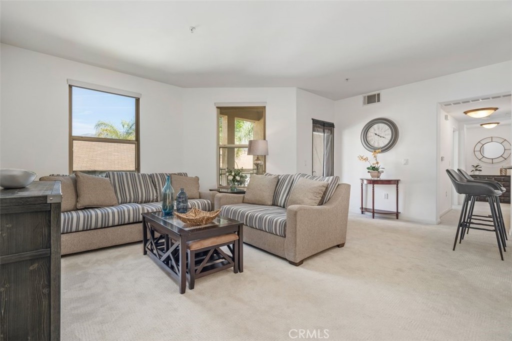 128 North Oak Knoll Avenue, Unit 317 Pasadena, CA 91101 - Photo 4 of 22 a living room with furniture
