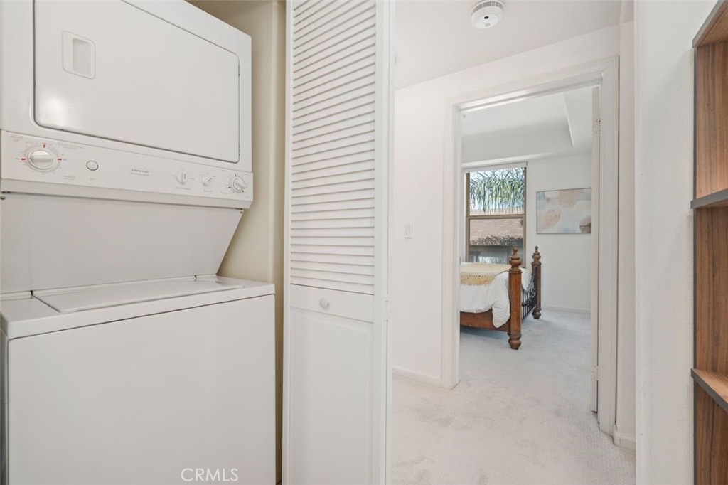 128 North Oak Knoll Avenue, Unit 317 Pasadena, CA 91101 - Photo 10 of 22 a utility room with dryer and washer