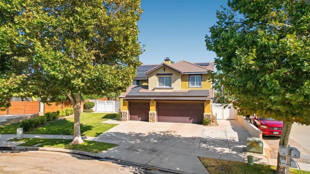 321 Adirondack Drive Corona, CA 92881 - Photo 18 of 22 a front view of a house with a garden