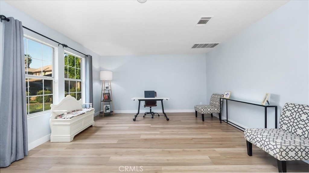 321 Adirondack Drive Corona, CA 92881 - Photo 2 of 22 a living room with furniture and wooden floor