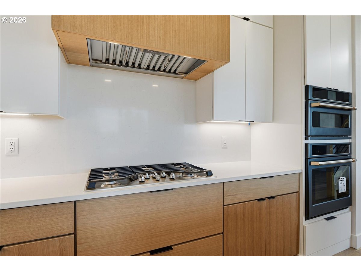 1597 Northwest Goodwin Street Camas, WA 98607 - Photo 13 of 44 a kitchen with cabinets and appliances