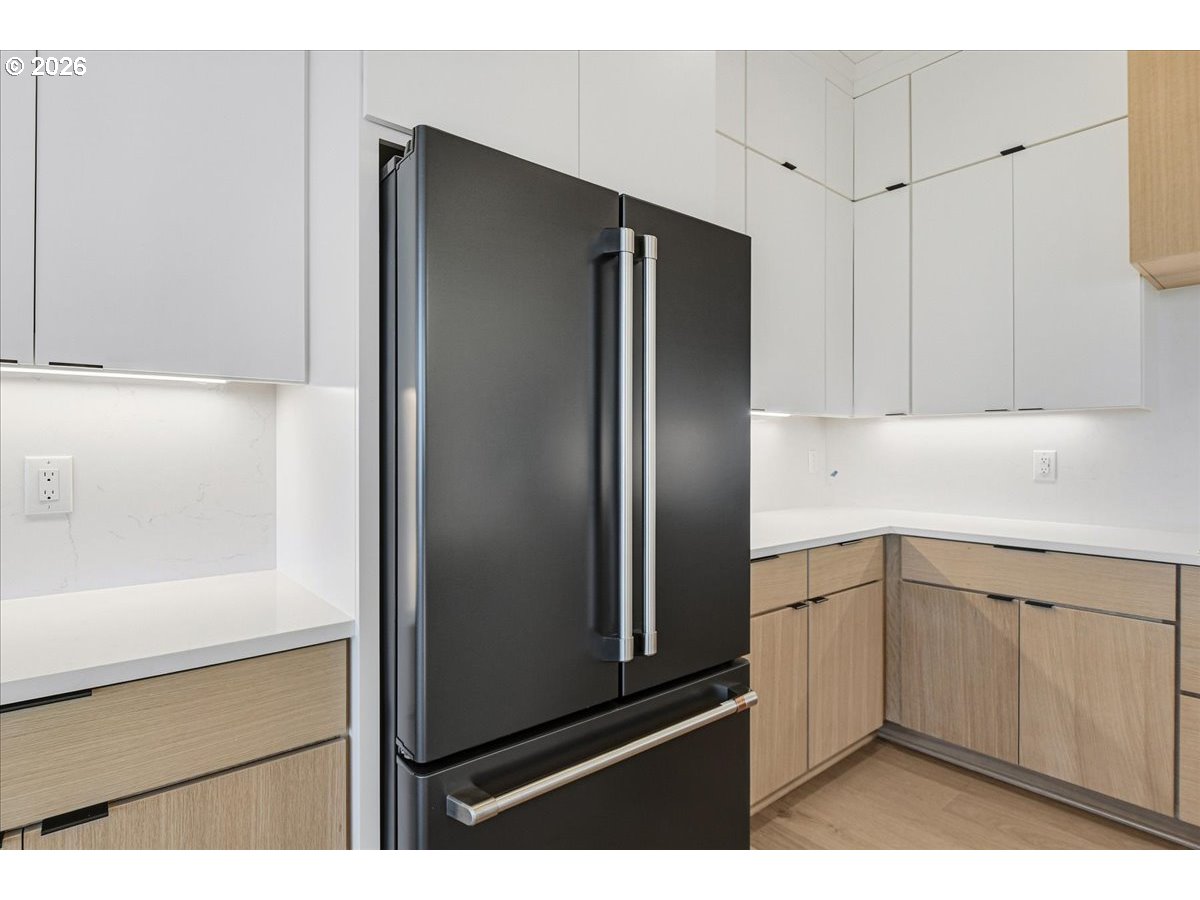 1597 Northwest Goodwin Street Camas, WA 98607 - Photo 14 of 44 a kitchen with cabinets and stainless steel appliances