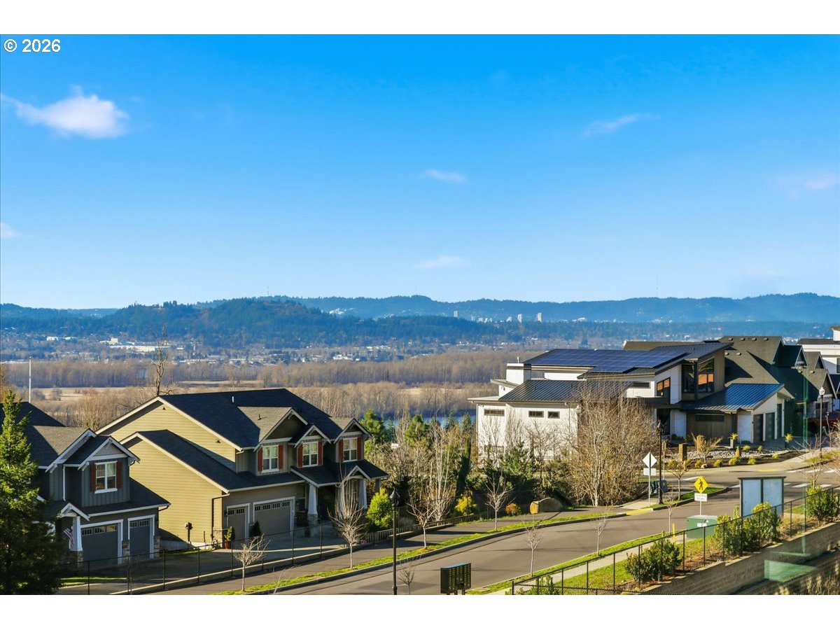 1597 Northwest Goodwin Street Camas, WA 98607 - Photo 16 of 44 an aerial view of residential houses with outdoor space and ocean view