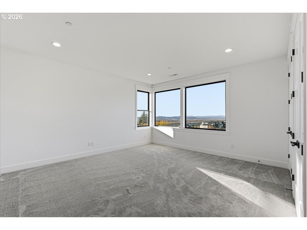 1597 Northwest Goodwin Street Camas, WA 98607 - Photo 22 of 44 a view of an empty room with a window
