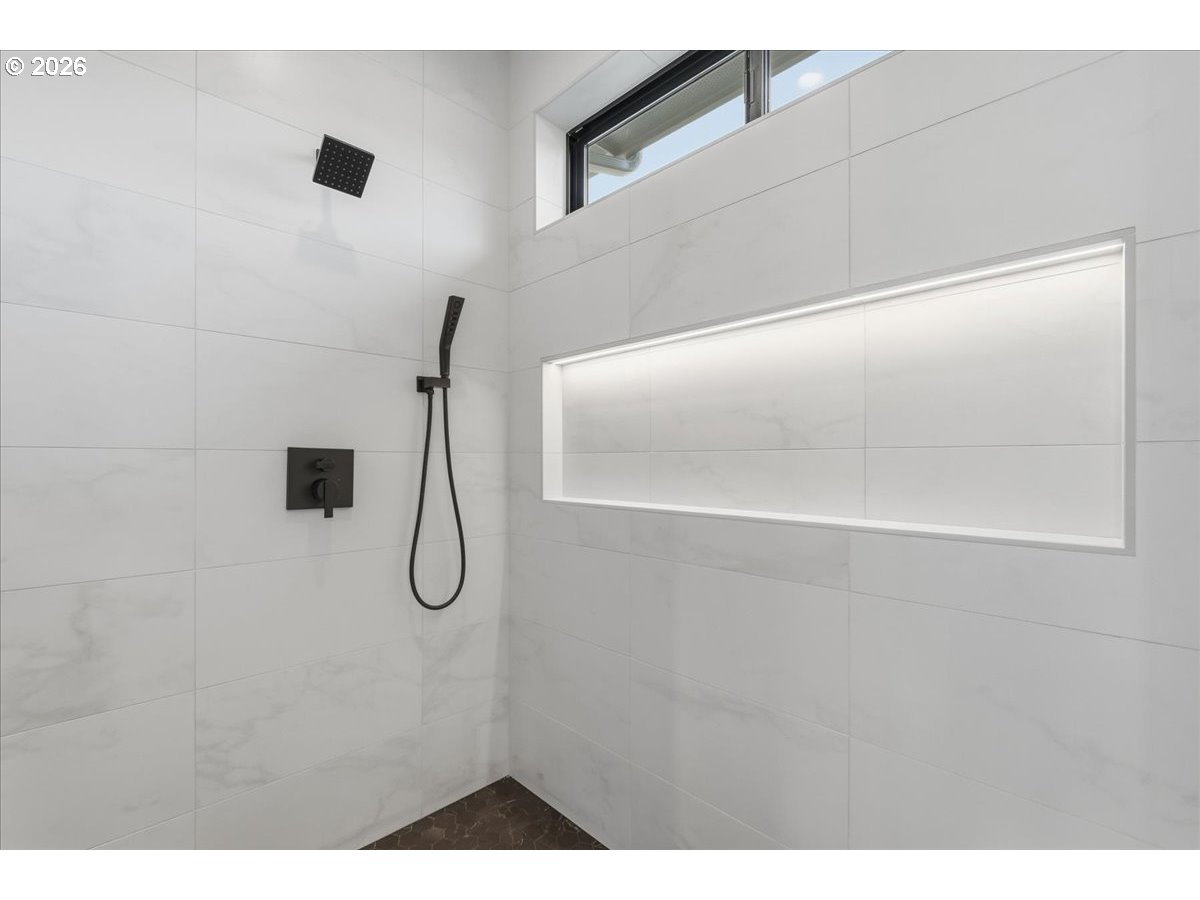 1597 Northwest Goodwin Street Camas, WA 98607 - Photo 29 of 44 a bathroom with a shower