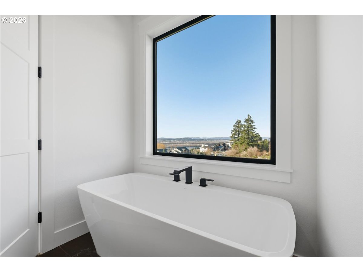 1597 Northwest Goodwin Street Camas, WA 98607 - Photo 30 of 44 a bathroom with a sink and a mirror