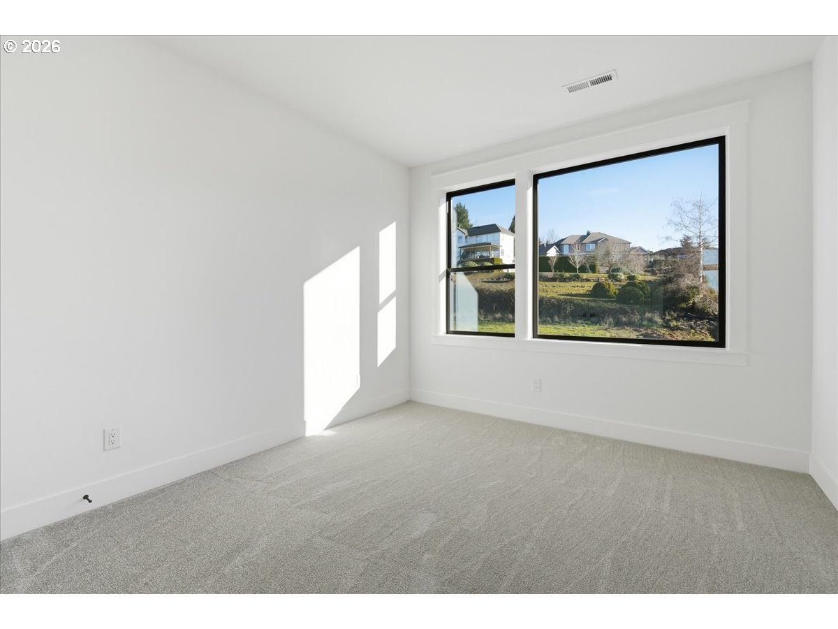 1597 Northwest Goodwin Street Camas, WA 98607 - Photo 35 of 44 a view of an empty room with a window
