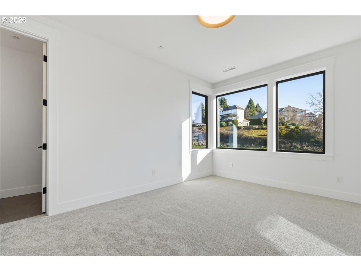 1597 Northwest Goodwin Street Camas, WA 98607 - Photo 39 of 44 a view of an empty room with a window