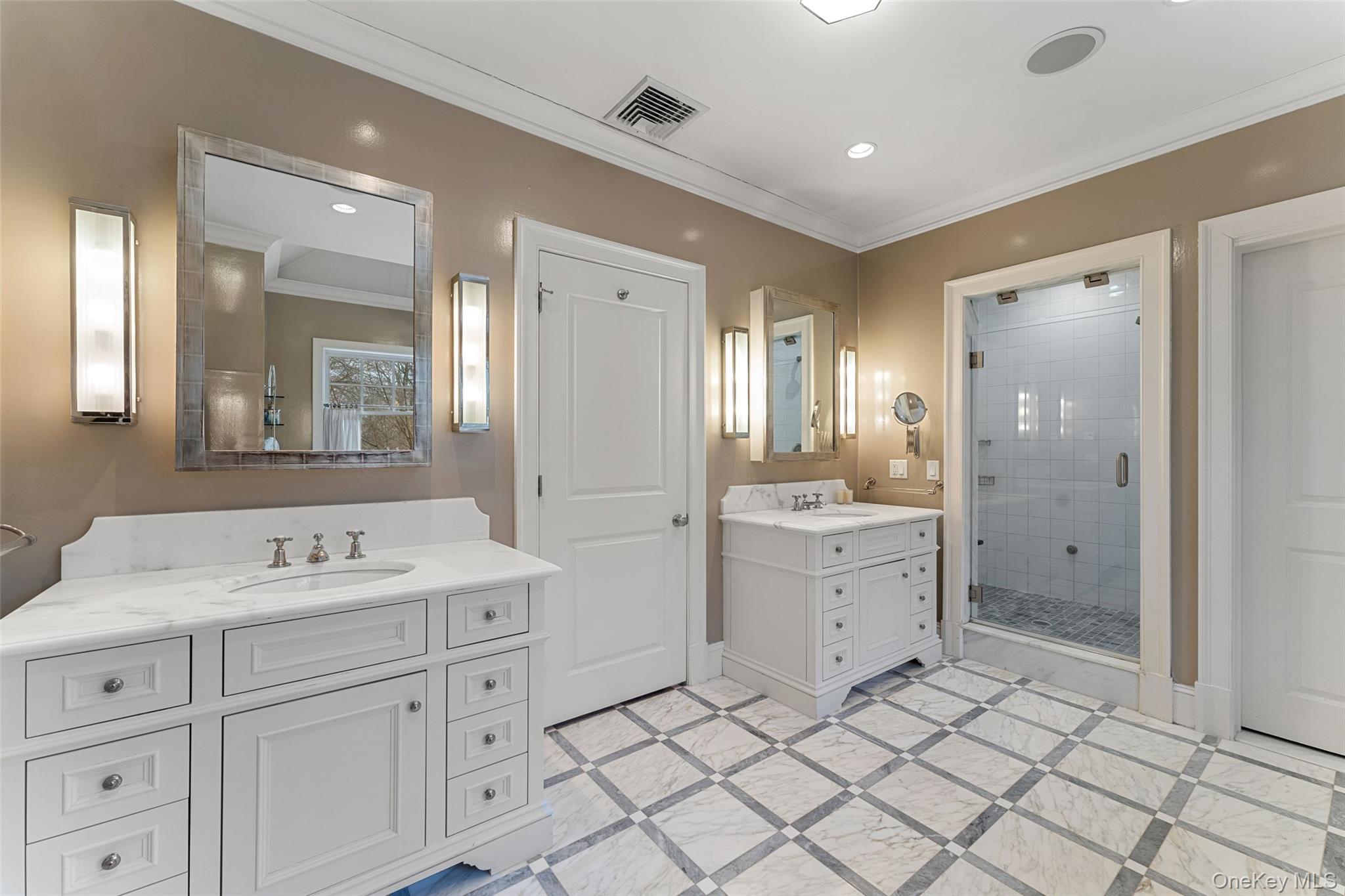 35 Eton Road Scarsdale, NY 10583 - Photo 20 of 43 Primary bath with double vanity and steam shower with seamless glass enclosure