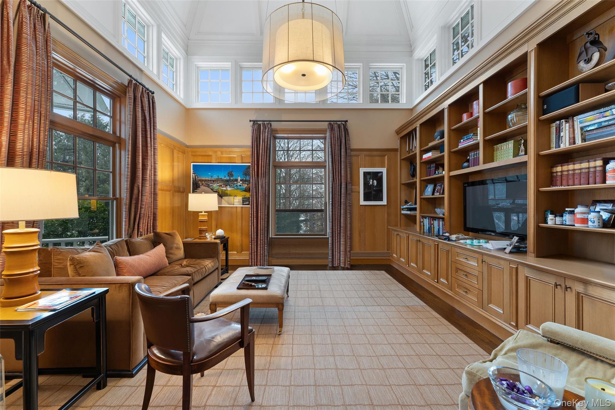 35 Eton Road Scarsdale, NY 10583 - Photo 5 of 43 Paneled library with soaring tray ceiling and custom cabinetry