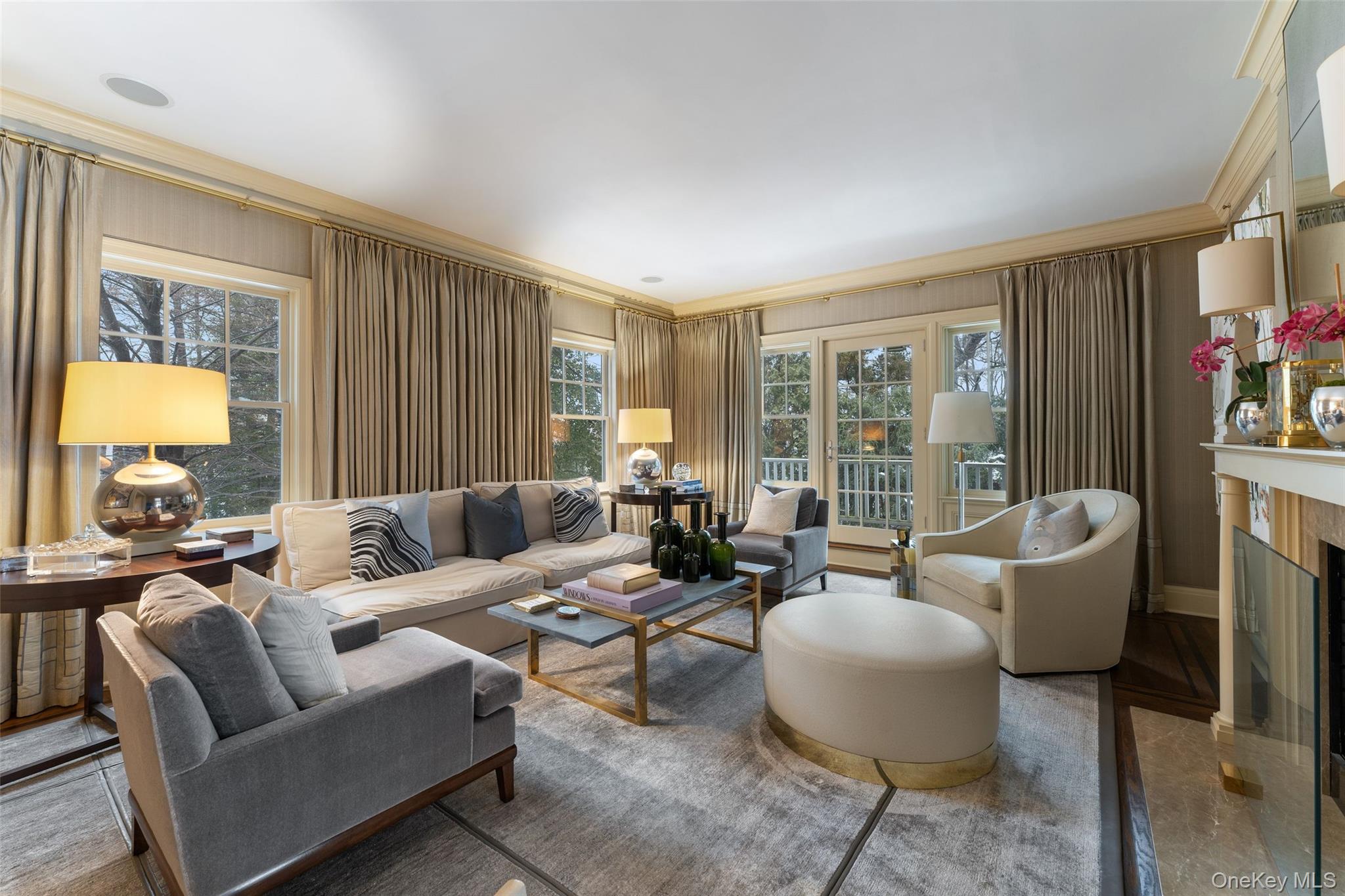 35 Eton Road Scarsdale, NY 10583 - Photo 6 of 43 Living room with balcony and gas fireplace