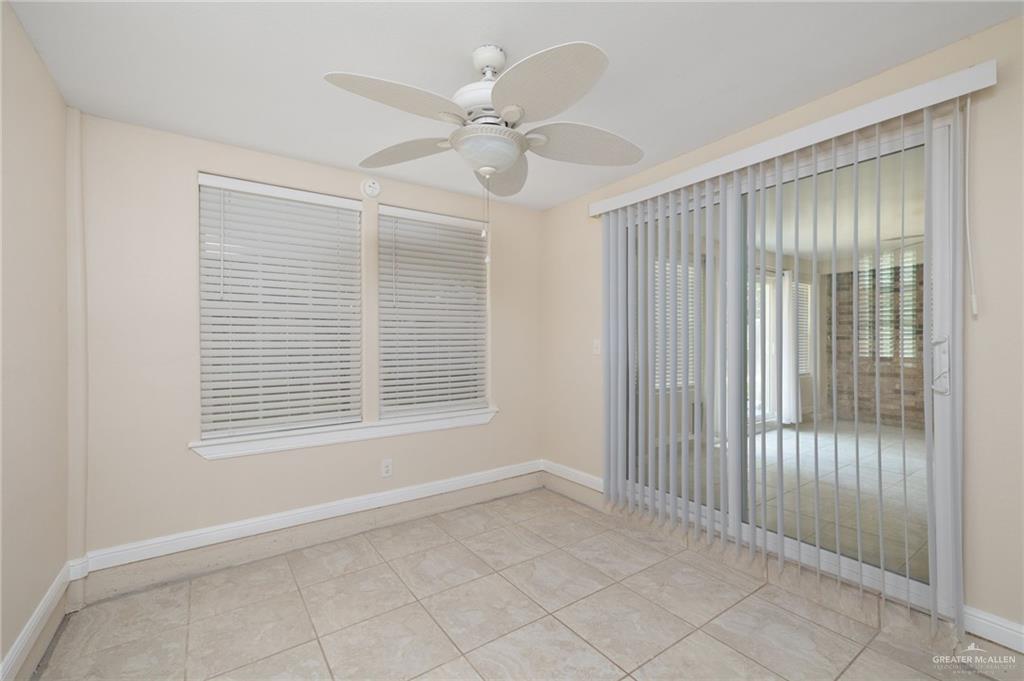 604 Hidden Trace Weslaco, TX 78599 - Photo 11 of 20 a view of an empty room with a window