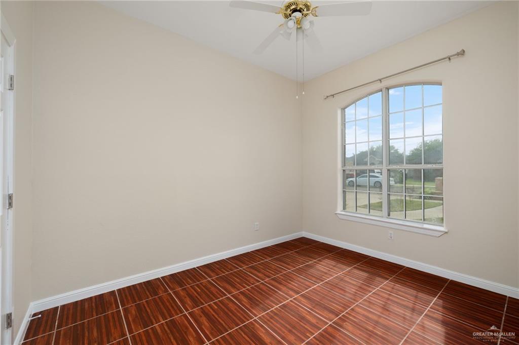 604 Hidden Trace Weslaco, TX 78599 - Photo 12 of 20 a view of an empty room with a window
