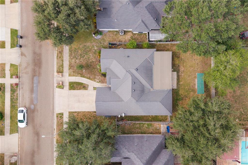604 Hidden Trace Weslaco, TX 78599 - Photo 17 of 20 an aerial view of residential houses with outdoor space and street view