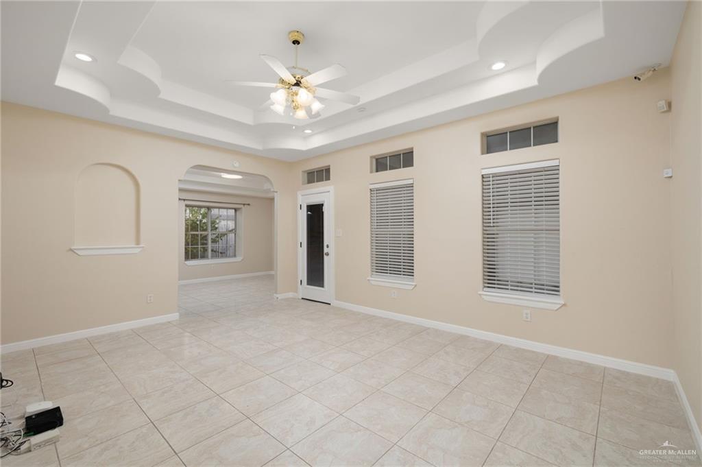 604 Hidden Trace Weslaco, TX 78599 - Photo 3 of 20 a view of an empty room with a window