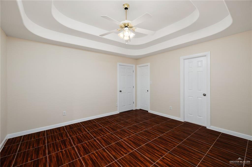 604 Hidden Trace Weslaco, TX 78599 - Photo 6 of 20 a view of a room with wooden floor