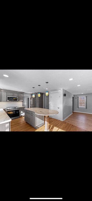 5 Vincent Road Attleboro, MA 02703 - Photo 12 of 32 a view of kitchen with kitchen island and sink