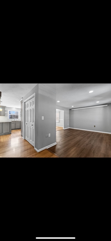 5 Vincent Road Attleboro, MA 02703 - Photo 19 of 32 a view of a living room with a kitchen island