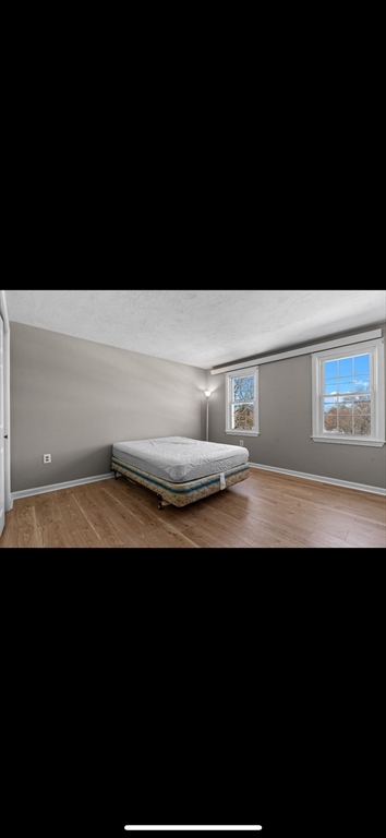 5 Vincent Road Attleboro, MA 02703 - Photo 24 of 32 a view of a room with wooden floor