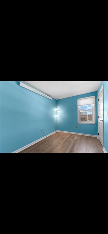 5 Vincent Road Attleboro, MA 02703 - Photo 25 of 32 a view of a room with wooden floor and windows