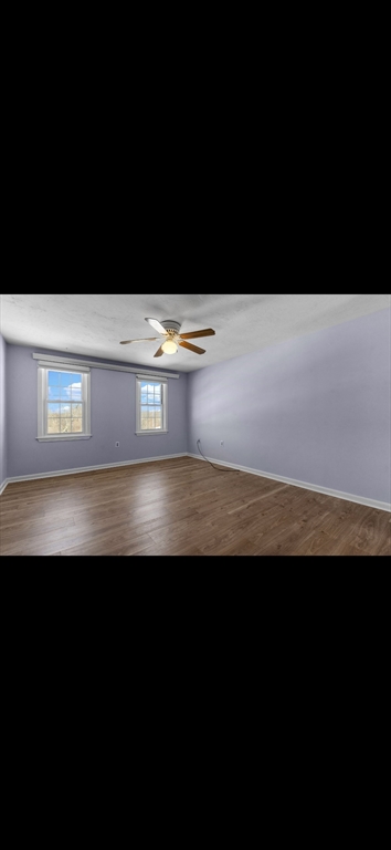 5 Vincent Road Attleboro, MA 02703 - Photo 26 of 32 a view of a living room with a kitchen island