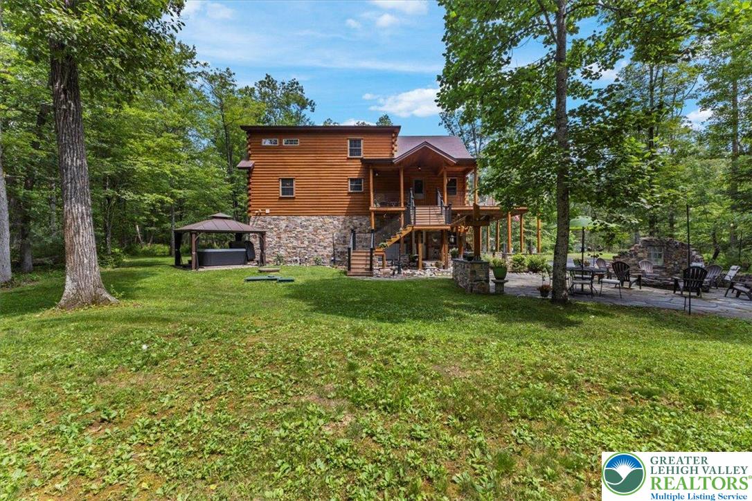 207 West Douglasville Road Nazareth, PA 18064 - Photo 15 of 73 a view of a house with a yard porch and sitting area