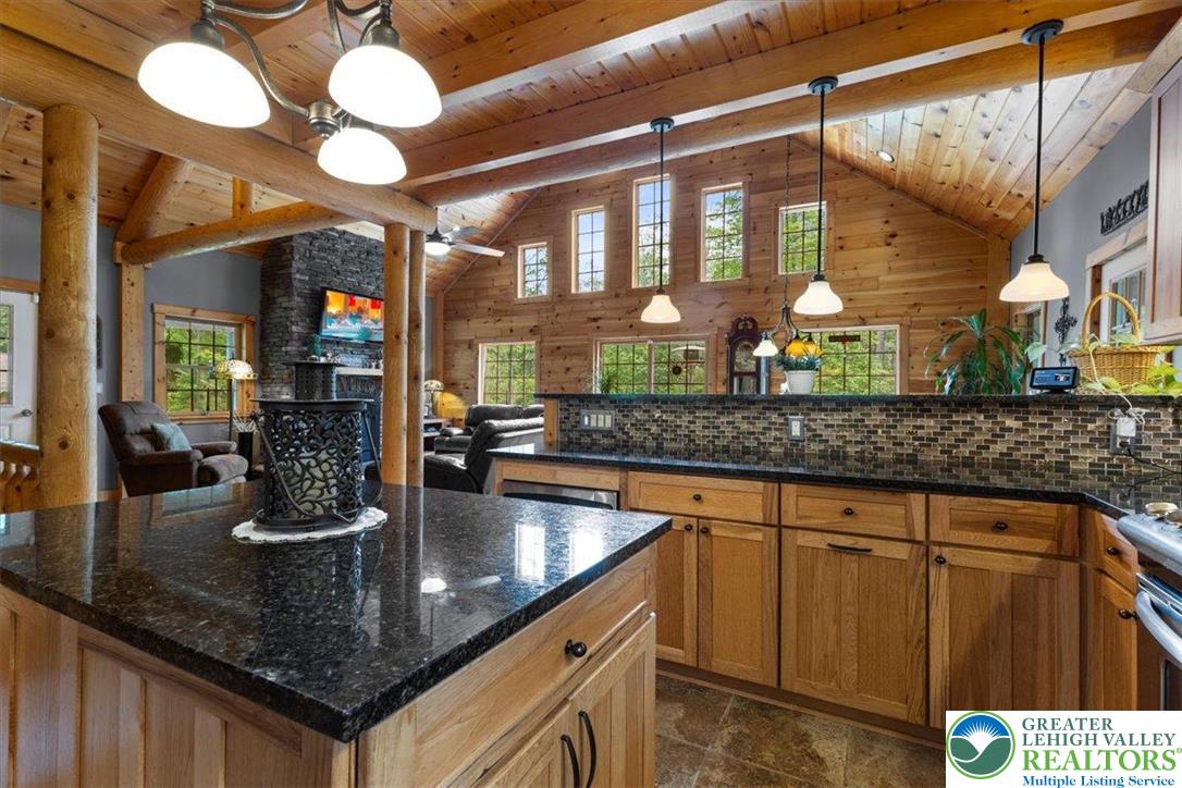 207 West Douglasville Road Nazareth, PA 18064 - Photo 32 of 73 a kitchen with stainless steel appliances granite countertop a sink and cabinets
