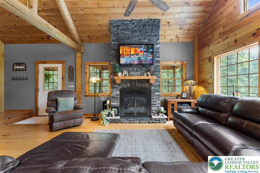 207 West Douglasville Road Nazareth, PA 18064 - Photo 39 of 73 a living room with fireplace furniture and a large window