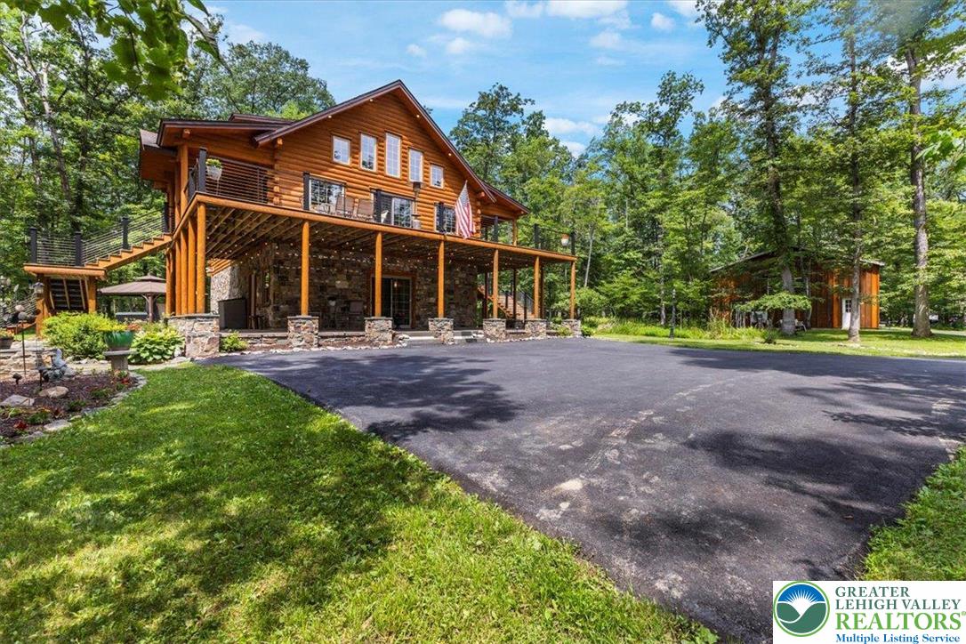 207 West Douglasville Road Nazareth, PA 18064 - Photo 5 of 73 a front view of a house with a yard