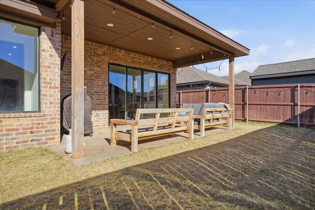 a view of house with patio
