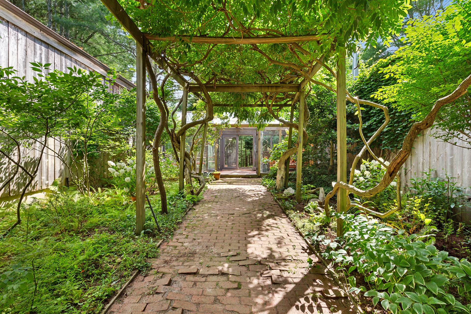 36 Edwards Hole Road East Hampton, NY 11937 - Photo 21 of 23 a view of a pathway with a yard