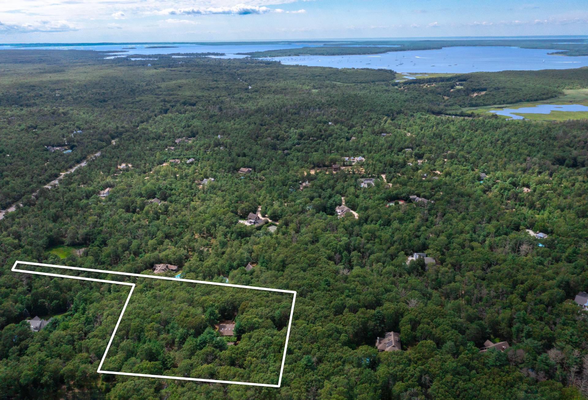 36 Edwards Hole Road East Hampton, NY 11937 - Photo 23 of 23 a view of a yard with a mountain