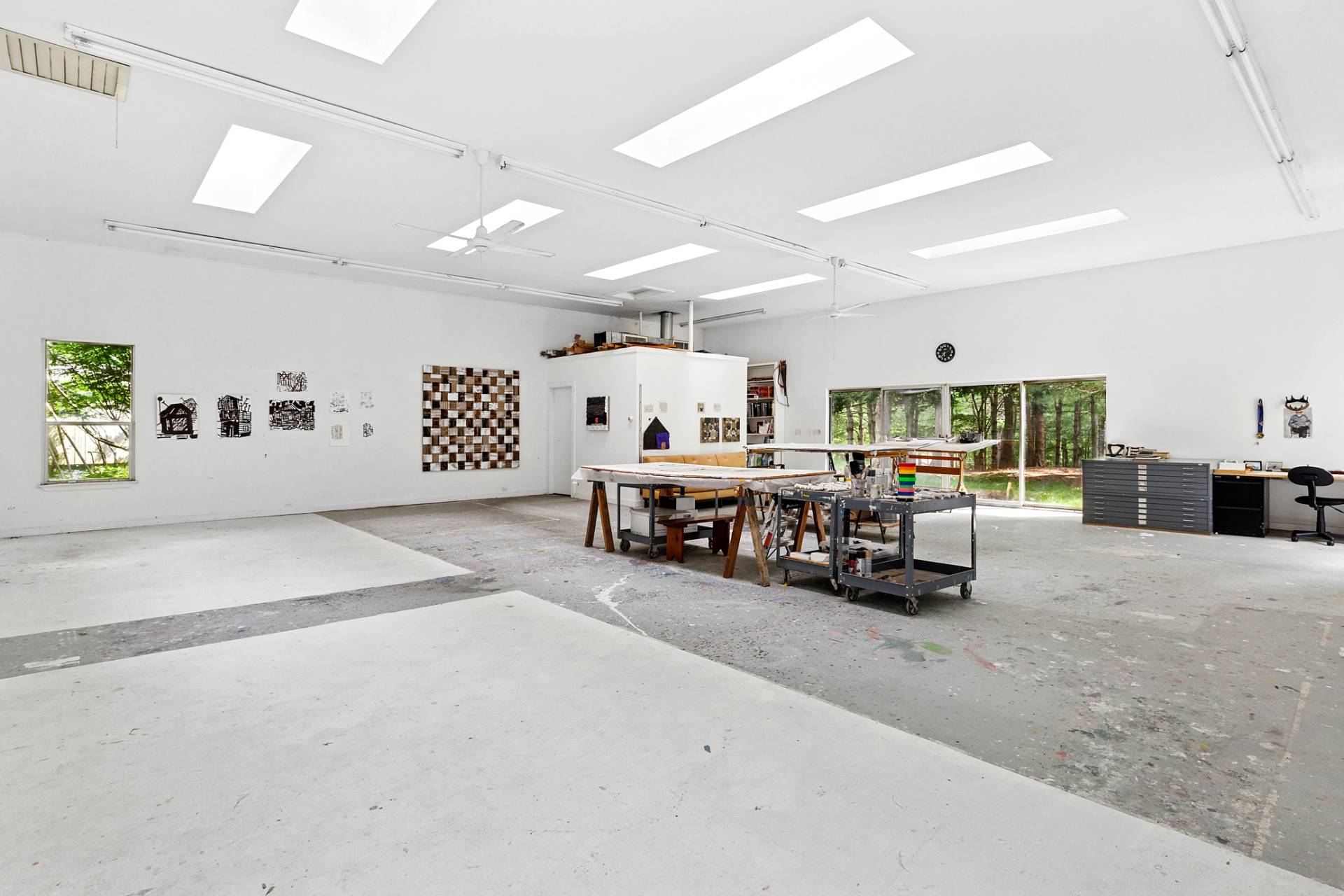 36 Edwards Hole Road East Hampton, NY 11937 - Photo 4 of 23 a large room with lots of furniture and a large window