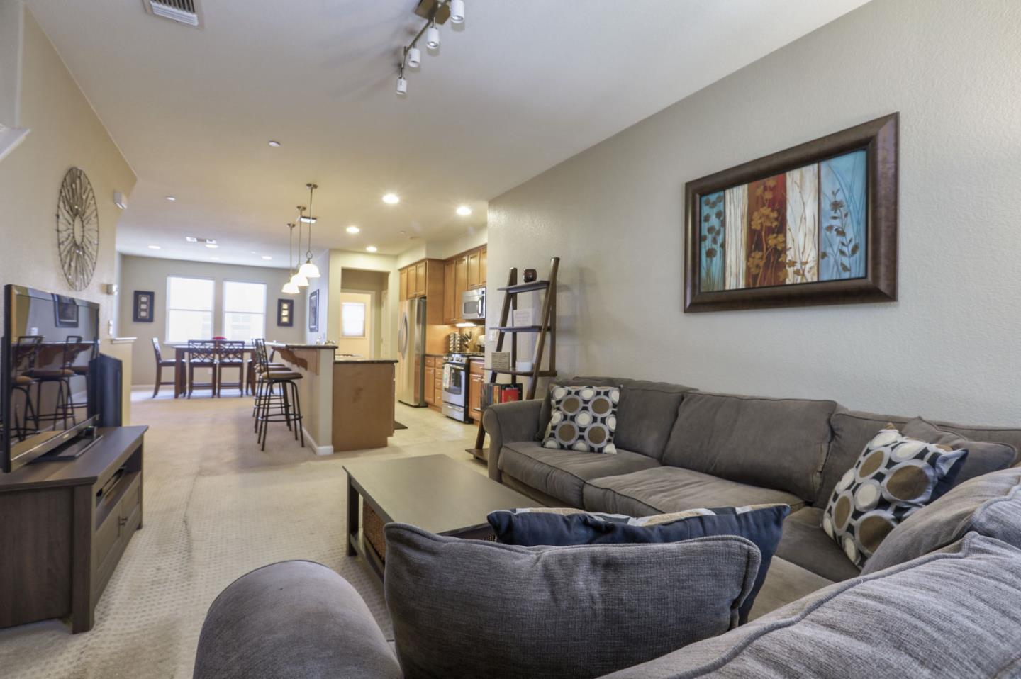907 Rancho Place San Jose, CA 95126 - Photo 13 of 50 a living room with furniture and a flat screen tv