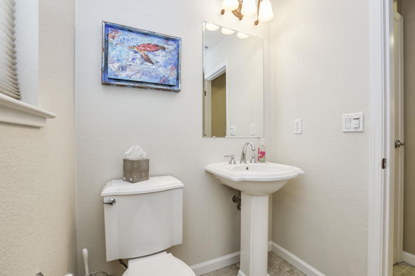 907 Rancho Place San Jose, CA 95126 - Photo 26 of 50 a bathroom with a sink mirror and toilet