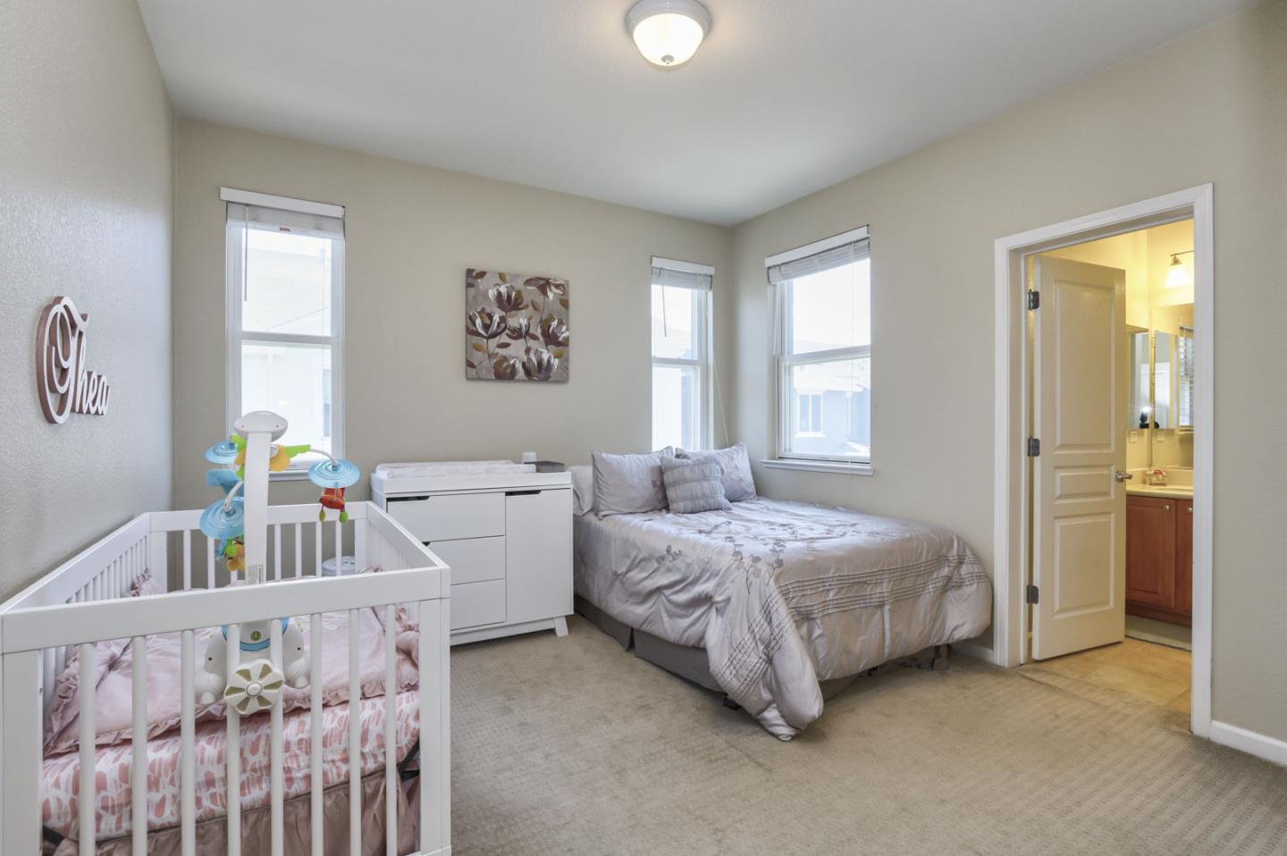 907 Rancho Place San Jose, CA 95126 - Photo 28 of 50 a bedroom with two beds and a window