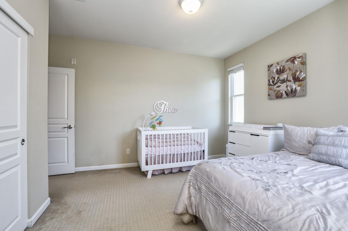 907 Rancho Place San Jose, CA 95126 - Photo 29 of 50 a bedroom with two beds and painted walls